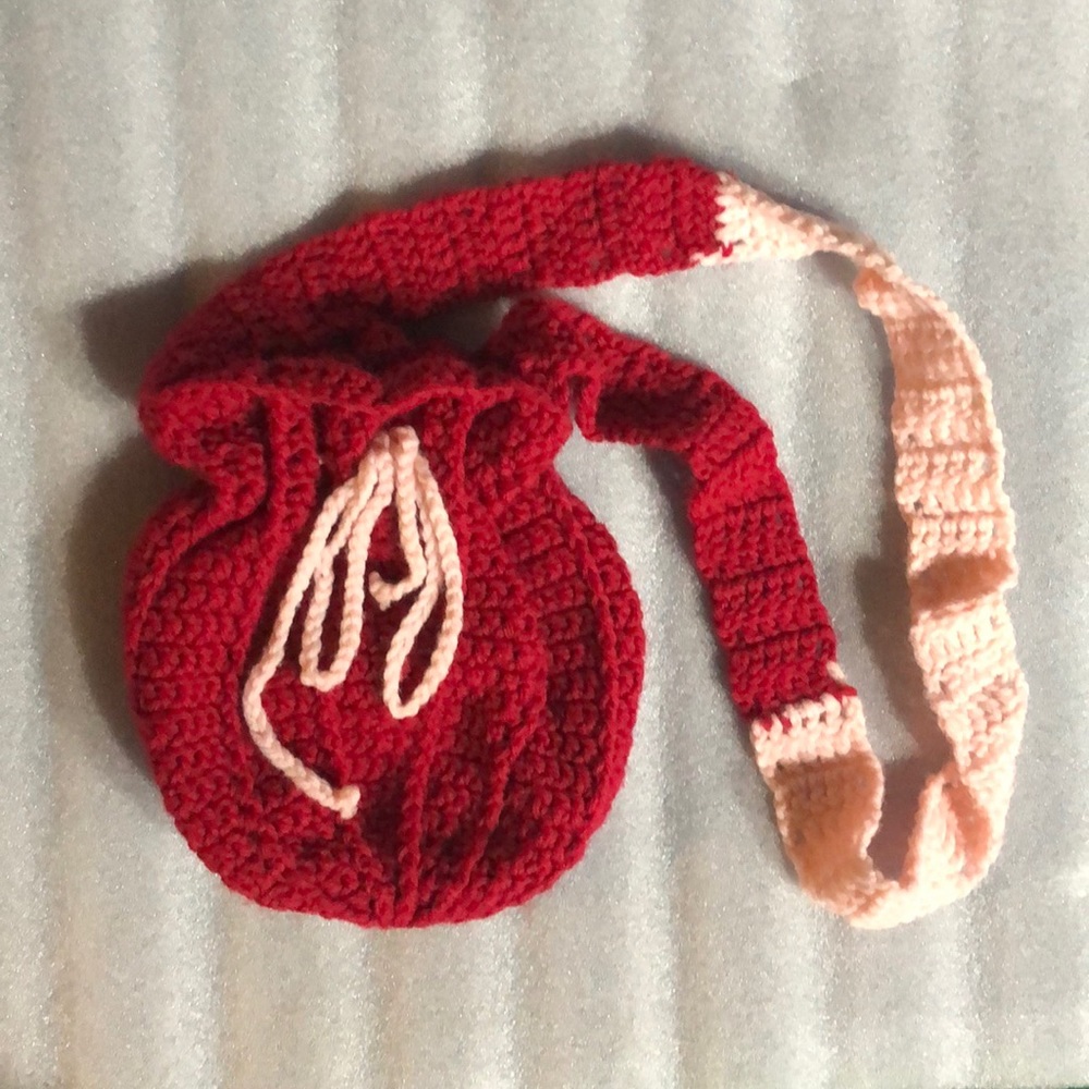 Pinkish red drawstring bag
